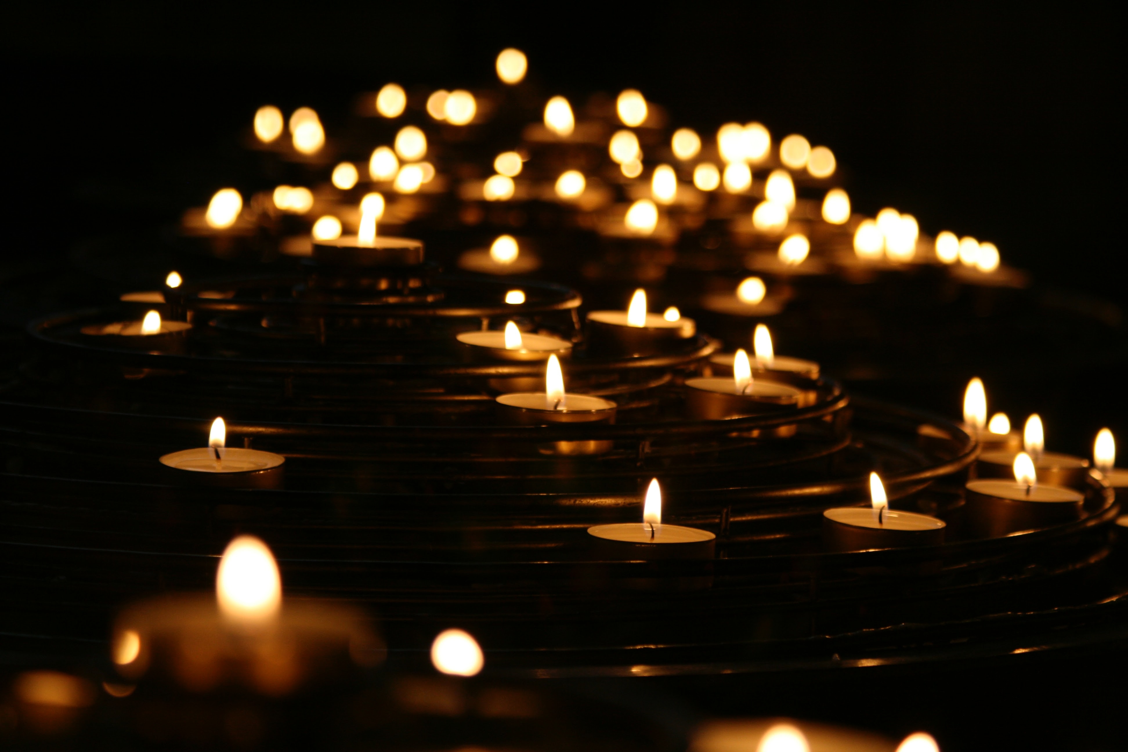 candles burning in the darkness